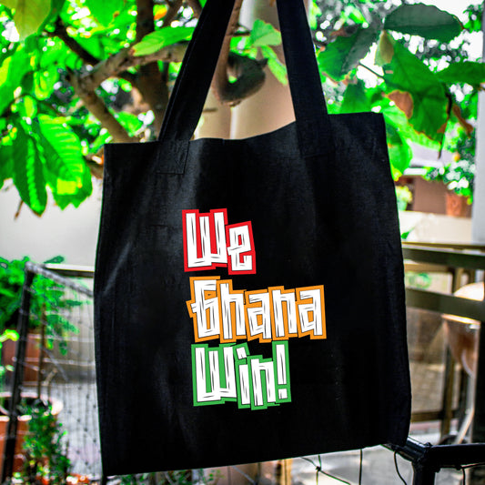 A tote bag with We Ghana Win on the fronot