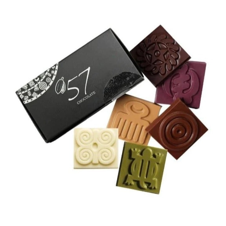 Six bite-sized bars beautifully engraved with adinkra symbols created by the Ashanti of Ghana.