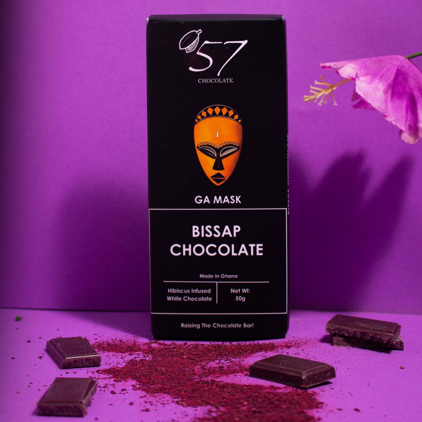 Box of 57 Bissap Chocolate with a purple background