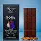 Milk chocolate bar with a woman playing the kora on the front cover.